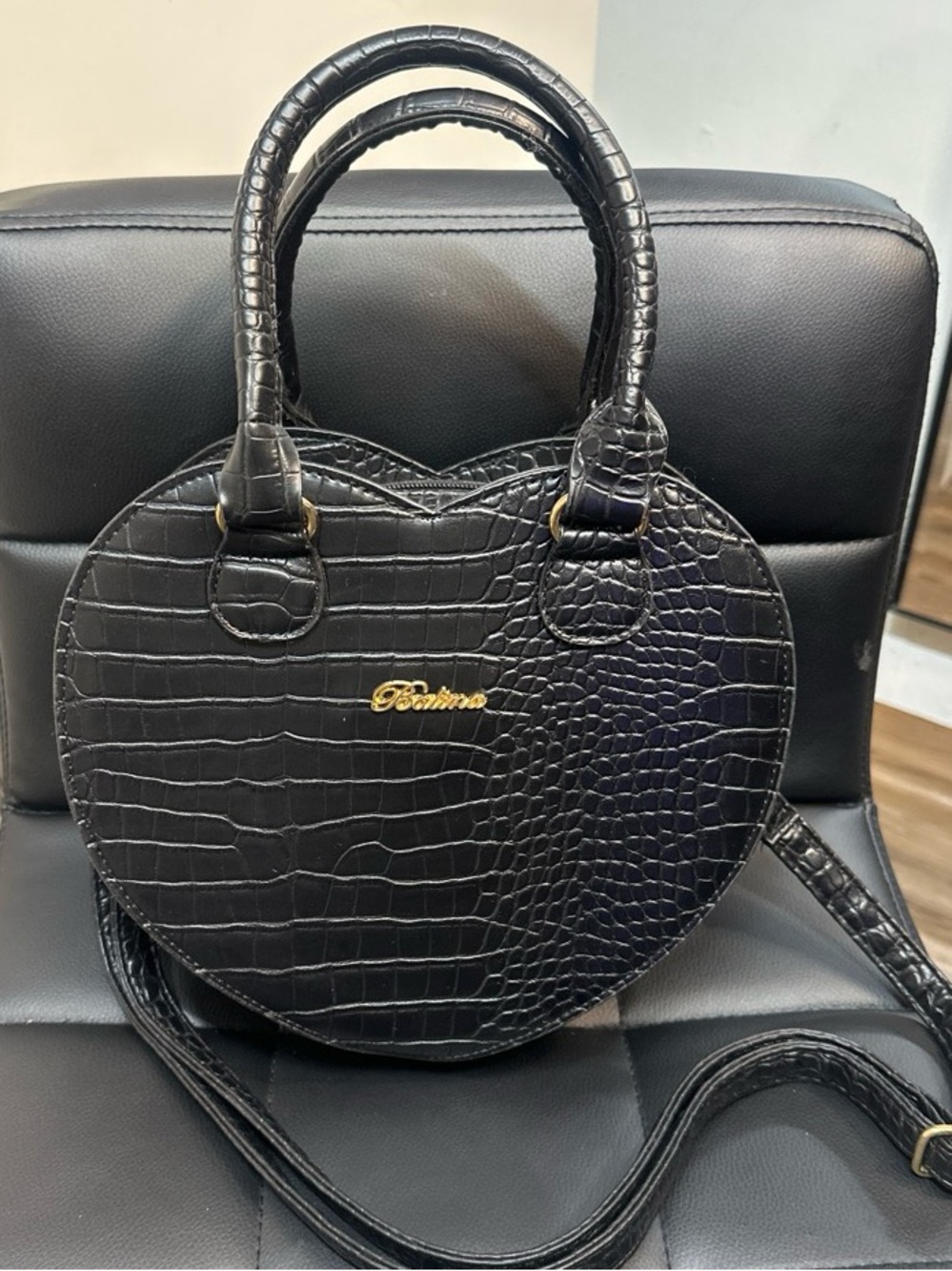 Heart-Shaped Black Croc-Embossed Handbag with Gold Logo
